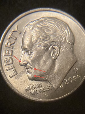 2005 Roosevelt dime die chip error showing raised irregular bump from chipped die surface